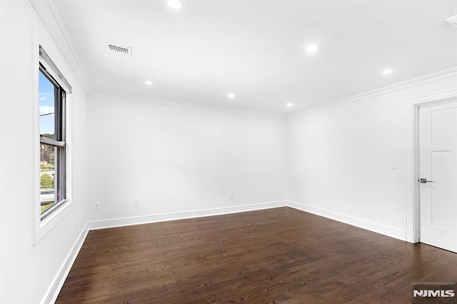309 Clinton Ave, Bergenfield, NJ 07621 - empty room with dark wood-type flooring, recessed lighting, and crown molding