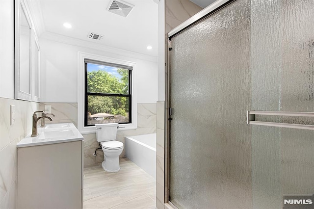 309 Clinton Ave, Bergenfield, NJ 07621 - full bathroom with tile walls, vanity, crown molding, and a shower stall