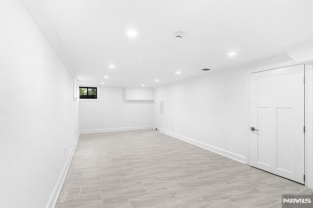 309 Clinton Ave, Bergenfield, NJ 07621 - below grade area with crown molding and recessed lighting
