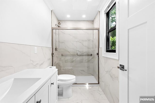 309 Clinton Ave, Bergenfield, NJ 07621 - bathroom with tile walls, marble finish floors, a marble finish shower, vanity, and recessed lighting