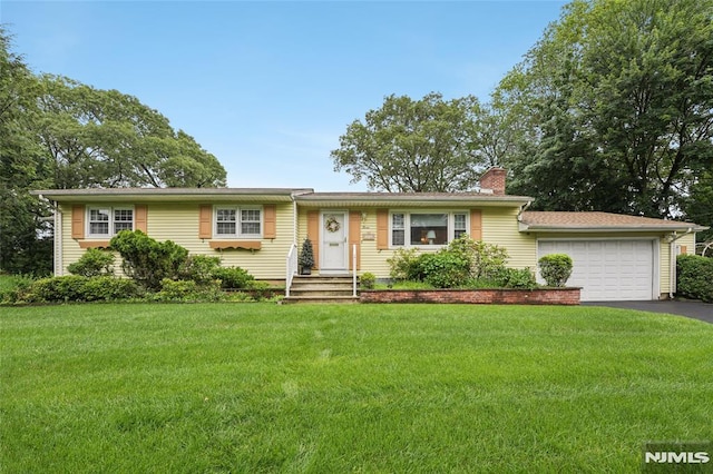 7 Meadow Ct, Midland Park, NJ 07432 - single story home with a chimney, asphalt driveway, a front lawn, and an attached garage