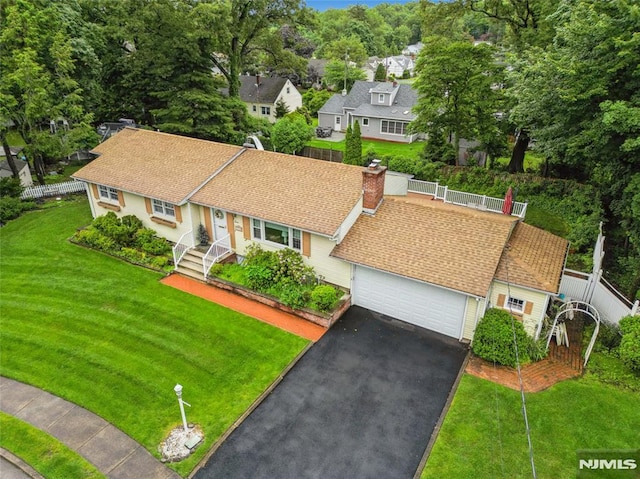 7 Meadow Ct, Midland Park, NJ 07432 - view of front of property with asphalt driveway, an attached garage, a residential view, and a chimney