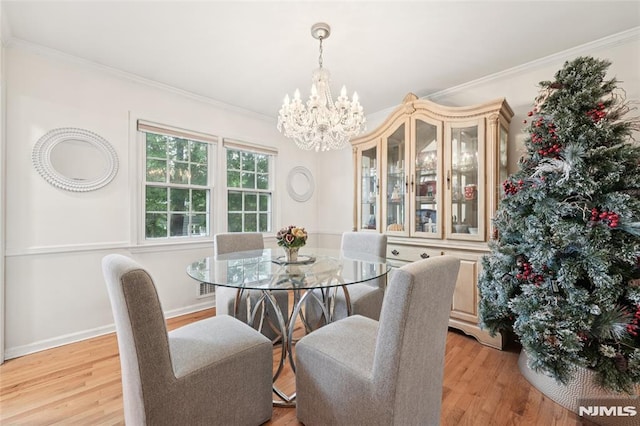 7 Meadow Ct, Midland Park, NJ 07432 - dining room featuring a chandelier, ornamental molding, and light wood-type flooring