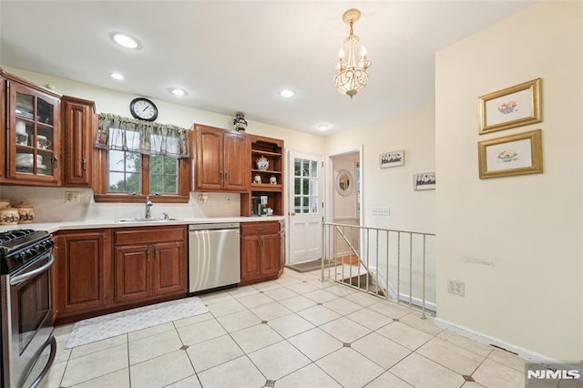 7 Meadow Ct, Midland Park, NJ 07432 - kitchen with stainless steel appliances, a chandelier, light countertops, glass insert cabinets, and recessed lighting