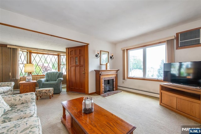 41 Gillies St, Clifton, NJ 07013 - carpeted living area featuring a baseboard radiator, a baseboard heating unit, and a fireplace