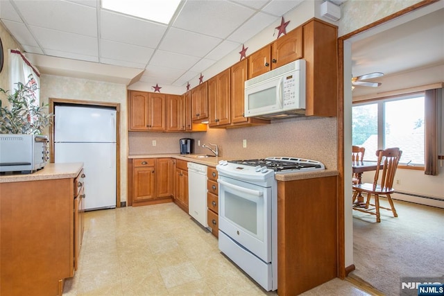 41 Gillies St, Clifton, NJ 07013 - kitchen with white appliances, a sink, light countertops, a paneled ceiling, and a ceiling fan