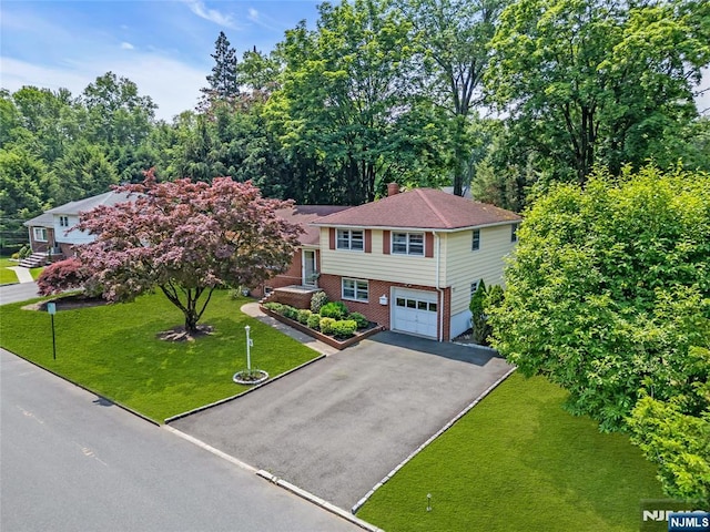 8 Delmar Ave, Cresskill, NJ 07626 - split level home with asphalt driveway, brick siding, a garage, a chimney, and a front lawn