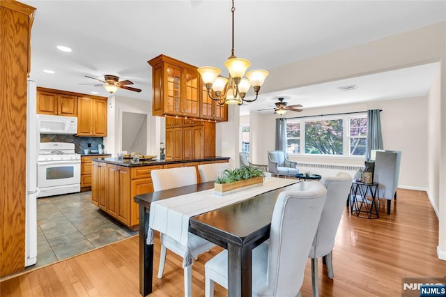 8 Delmar Ave, Cresskill, NJ 07626 - dining room featuring a ceiling fan, a chandelier, recessed lighting, light wood-type flooring, and baseboards