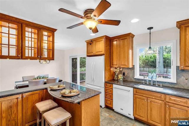 8 Delmar Ave, Cresskill, NJ 07626 - kitchen with white appliances, a sink, tasteful backsplash, healthy amount of natural light, and recessed lighting