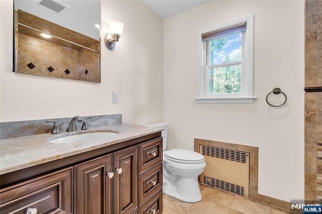8 Delmar Ave, Cresskill, NJ 07626 - bathroom with radiator, vanity, toilet, and a shower