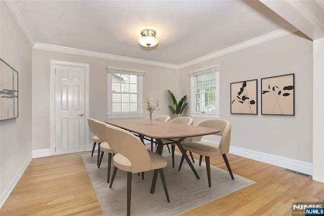 55 Beech St, Westwood, NJ 07675 - dining room with ornamental molding and light wood-style floors