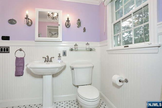 55 Beech St, Westwood, NJ 07675 - half bathroom featuring wainscoting and toilet