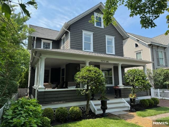  - view of front of home featuring a porch