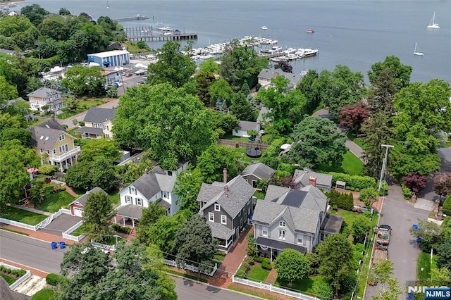  - aerial perspective of suburban area featuring a large body of water