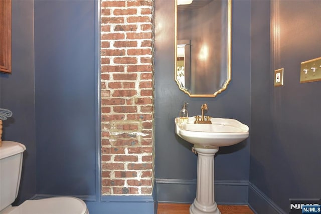  - bathroom with toilet and a sink
