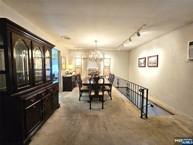 37 Pocohontas Path, Lincoln Park Borough, NJ 07035 - dining space featuring a chandelier, light carpet, rail lighting, and baseboards