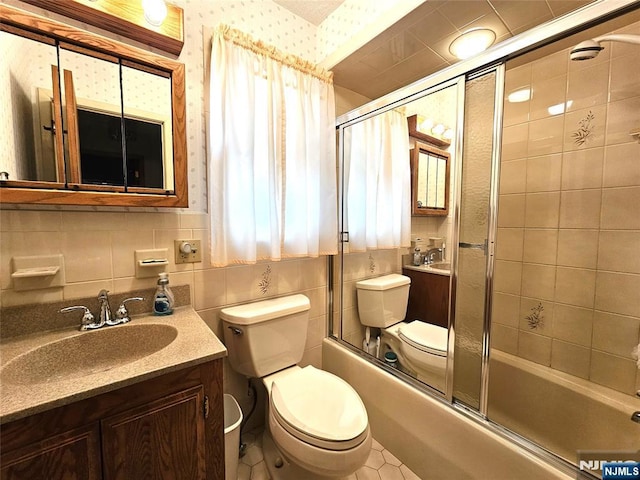 37 Pocohontas Path, Lincoln Park Borough, NJ 07035 - full bathroom with toilet, bath / shower combo with glass door, wallpapered walls, vanity, and tile patterned floors