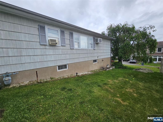 37 Pocohontas Path, Lincoln Park Borough, NJ 07035 - view of side of home featuring a lawn and cooling unit