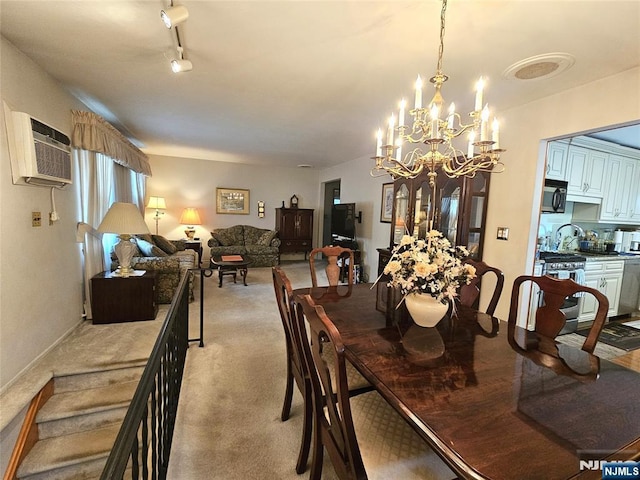 37 Pocohontas Path, Lincoln Park Borough, NJ 07035 - dining space featuring a chandelier, light carpet, and a wall mounted AC
