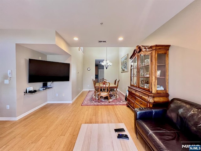 200 Dey St Unit 283, Harrison, NJ 07029 - living area with a chandelier, light wood finished floors, and recessed lighting