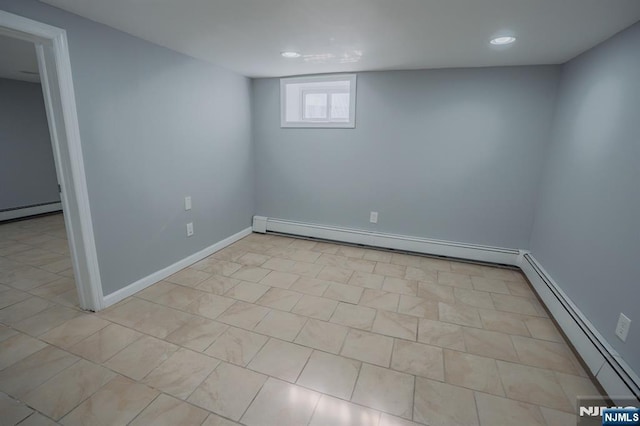 42 Berton Pl, Nutley, NJ 07110 - below grade area with a baseboard radiator, baseboard heating, baseboards, and recessed lighting