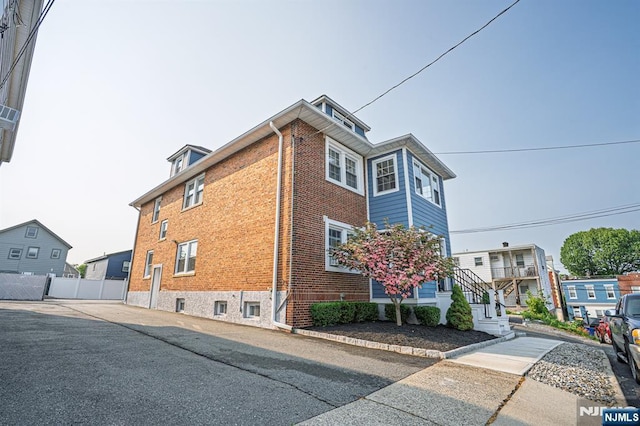 42 Berton Pl, Nutley, NJ 07110 - view of home's exterior with brick siding