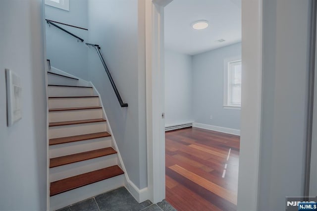 42 Berton Pl, Nutley, NJ 07110 - staircase with baseboard heating and baseboards