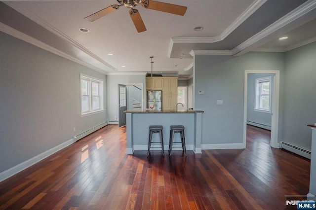 42 Berton Pl, Nutley, NJ 07110 - kitchen with a baseboard radiator, freestanding refrigerator, ceiling fan, ornamental molding, and recessed lighting