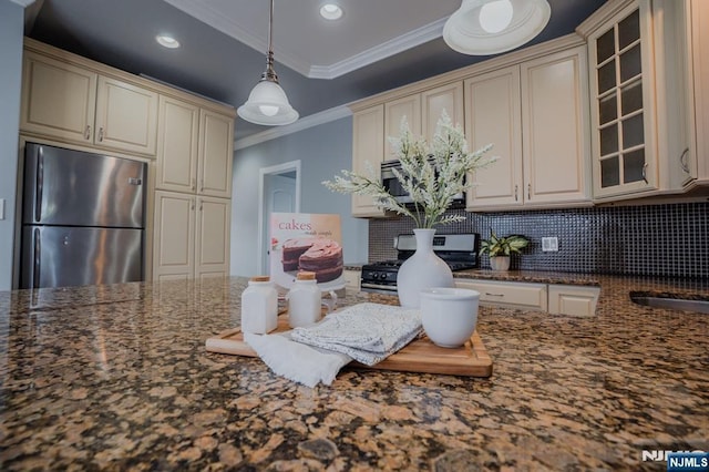 42 Berton Pl, Nutley, NJ 07110 - kitchen with stainless steel appliances, cream cabinetry, crown molding, tasteful backsplash, and glass insert cabinets