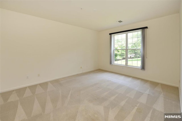 103 Four Seasons Unit 103, Wayne, NJ 07470 - empty room featuring baseboards and light carpet