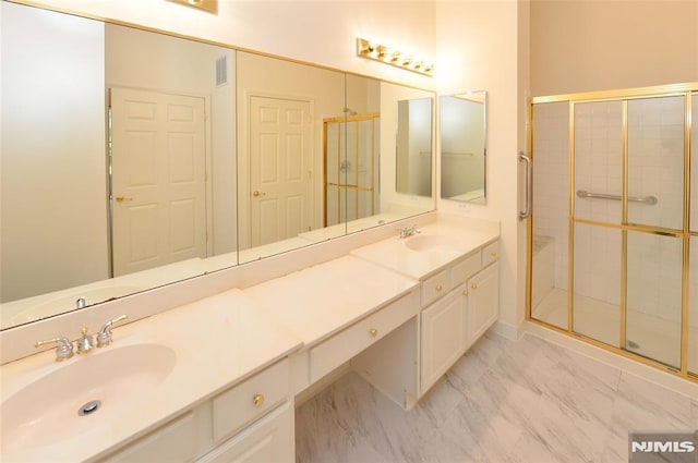 103 Four Seasons Unit 103, Wayne, NJ 07470 - full bath featuring a shower stall, double vanity, and marble look tiles