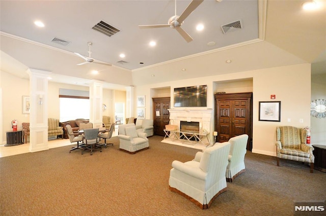 103 Four Seasons Unit 103, Wayne, NJ 07470 - carpeted living area with ornate columns, ceiling fan, crown molding, recessed lighting, and a glass covered fireplace