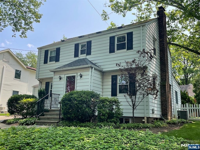 771 Stelton St, Teaneck, NJ 07666 - view of front of home featuring a chimney