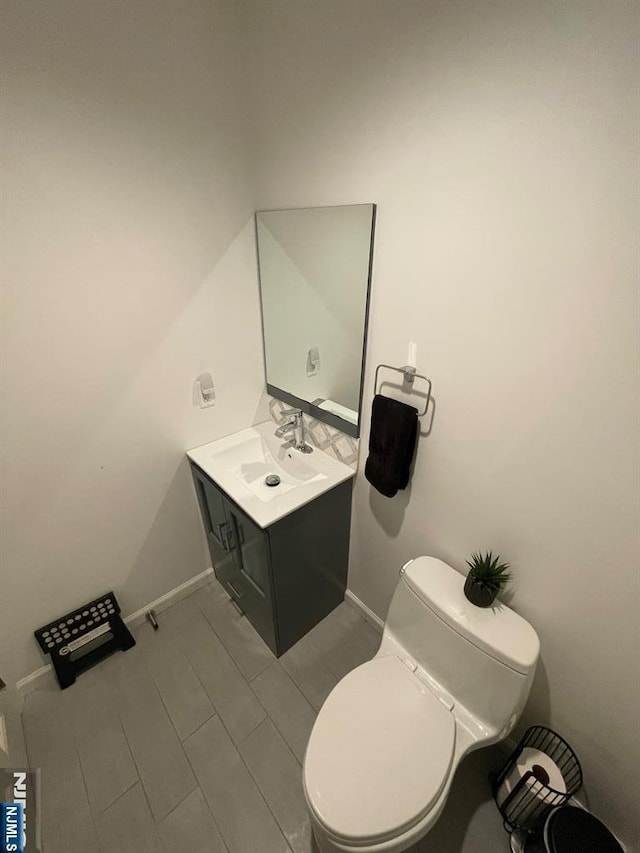 771 Stelton St, Teaneck, NJ 07666 - half bathroom with vanity and toilet