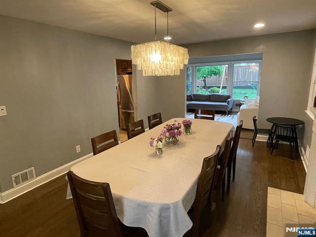 771 Stelton St, Teaneck, NJ 07666 - dining room featuring a chandelier, dark wood-style floors, and recessed lighting