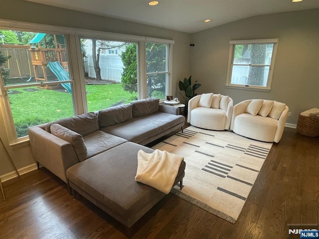 771 Stelton St, Teaneck, NJ 07666 - living area featuring wood finished floors, healthy amount of natural light, recessed lighting, and lofted ceiling