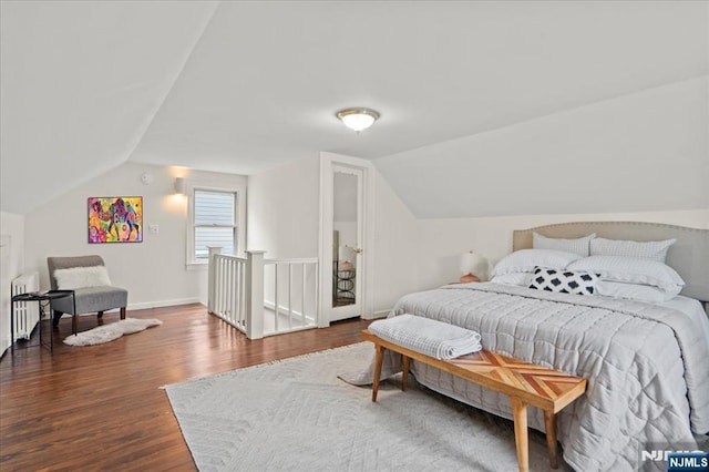 82 Elston St, Bloomfield, NJ 07003 - bedroom with radiator, vaulted ceiling, wood finished floors, and baseboards