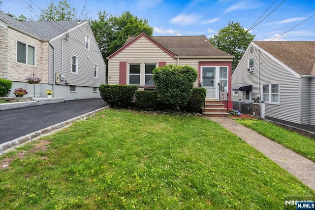 82 Elston St, Bloomfield, NJ 07003 - bungalow-style home with a front yard and entry steps