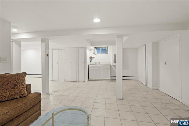 82 Elston St, Bloomfield, NJ 07003 - living area with recessed lighting, light tile patterned flooring, a baseboard radiator, and baseboard heating