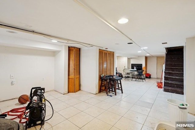 361/2 Hecker St, Newark, NJ 07103 - finished basement with stairway, light tile patterned flooring, and recessed lighting