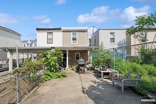 361/2 Hecker St, Newark, NJ 07103 - rear view of property featuring a patio