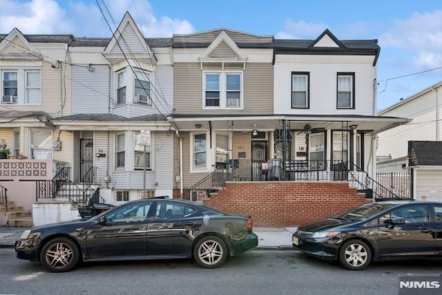 361/2 Hecker St, Newark, NJ 07103 - townhome / multi-family property with stairway and a porch