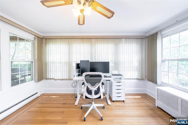 85 Paulin Blvd, Leonia, NJ 07605 - home office featuring radiator heating unit, a baseboard heating unit, plenty of natural light, and baseboards