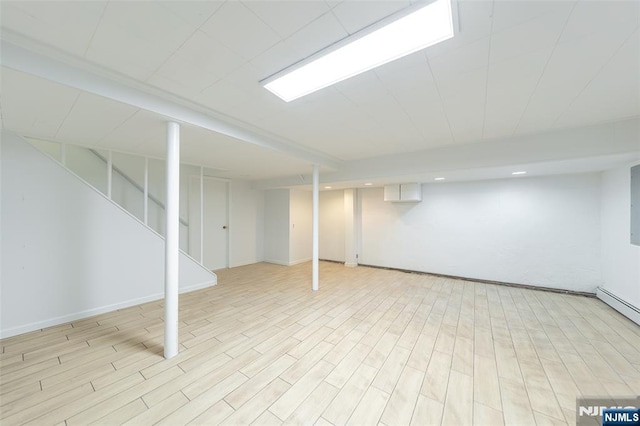 85 Paulin Blvd, Leonia, NJ 07605 - finished basement featuring light wood-style floors and stairway