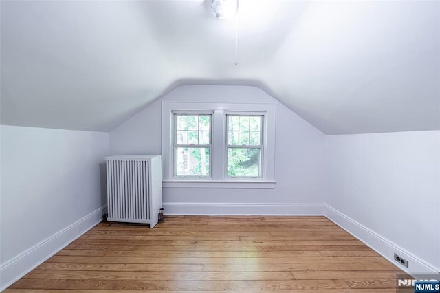 85 Paulin Blvd, Leonia, NJ 07605 - bonus room with radiator, hardwood / wood-style flooring, vaulted ceiling, and baseboards