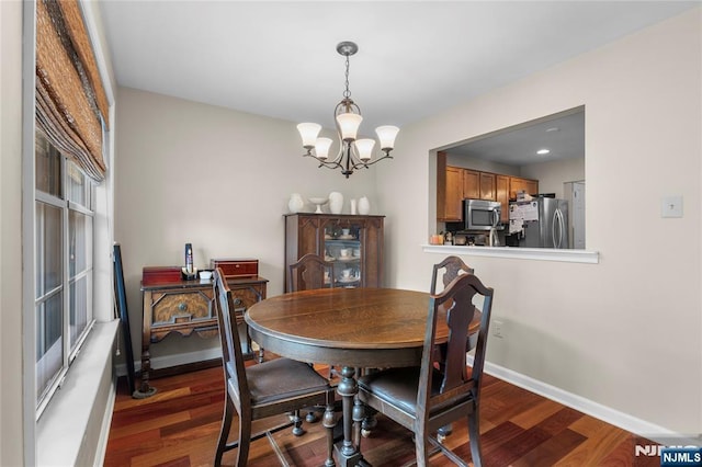35 Spruce Ct Unit 116, Clifton, NJ 07014 - dining area with a chandelier and wood finished floors