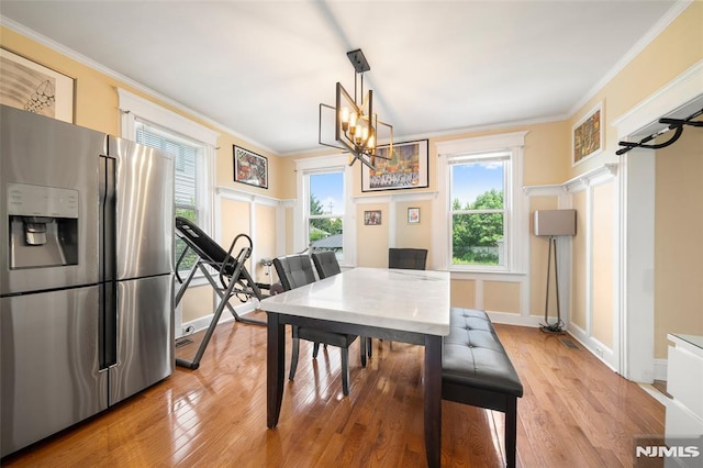 3 Drury Ln, Fort Lee, NJ 07024 - dining room featuring ornamental molding, a chandelier, light wood-type flooring, and baseboards