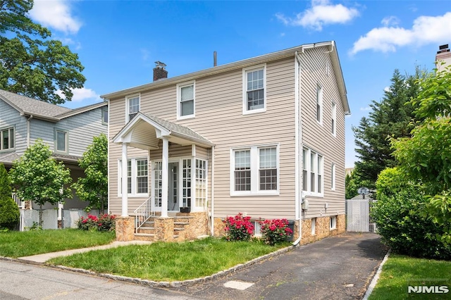 3 Drury Ln, Fort Lee, NJ 07024 - traditional-style home featuring a chimney