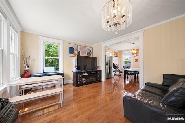 3 Drury Ln, Fort Lee, NJ 07024 - living area featuring a chandelier, crown molding, and wood finished floors