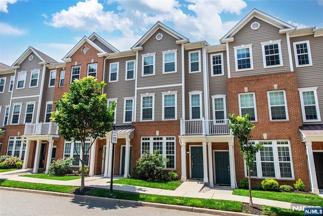 129 Eisenhower Ln Unit 2109, Wood Ridge, NJ 07075 - townhome / multi-family property with brick siding